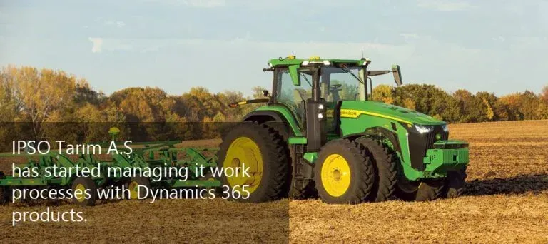 Green tractor working a farm field, reflecting IPSO Tarım's agricultural operations