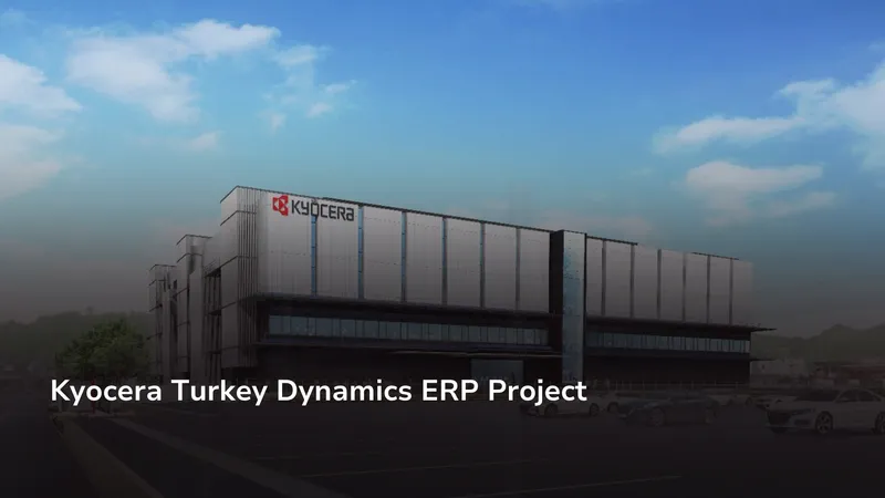 Rendering of a building facade with the KYOCERA logo, parking lot in front.