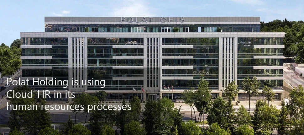 Polat Ofis building exterior, a multi-story glass office tower surrounded by trees