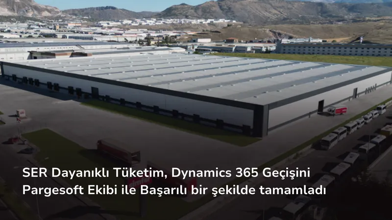 Havadan çekilmiş görüntüde büyük bir depo binası, önünde kamyonlar ve Simfer tabelası görünüyor