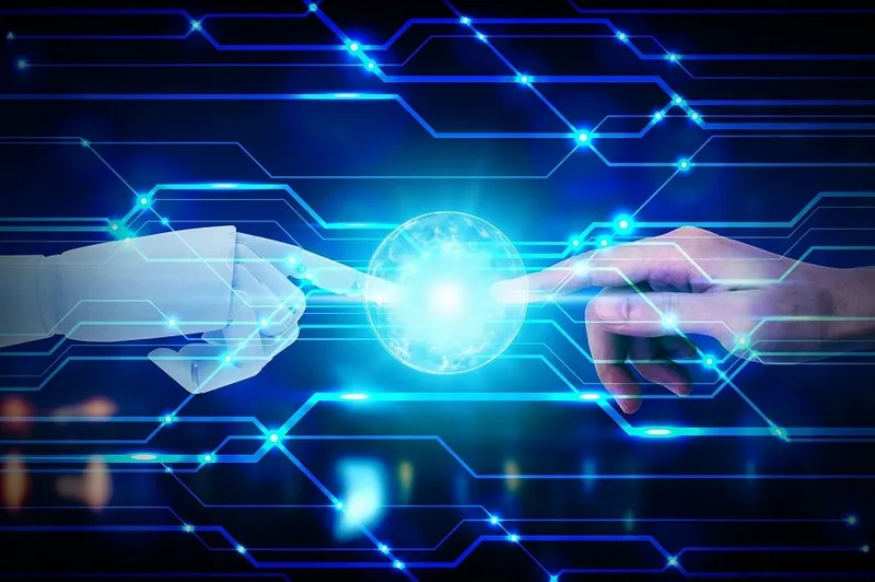 Bir robot eliyle insan elinin parmak uçlarının parlayan bir küreye dokunması