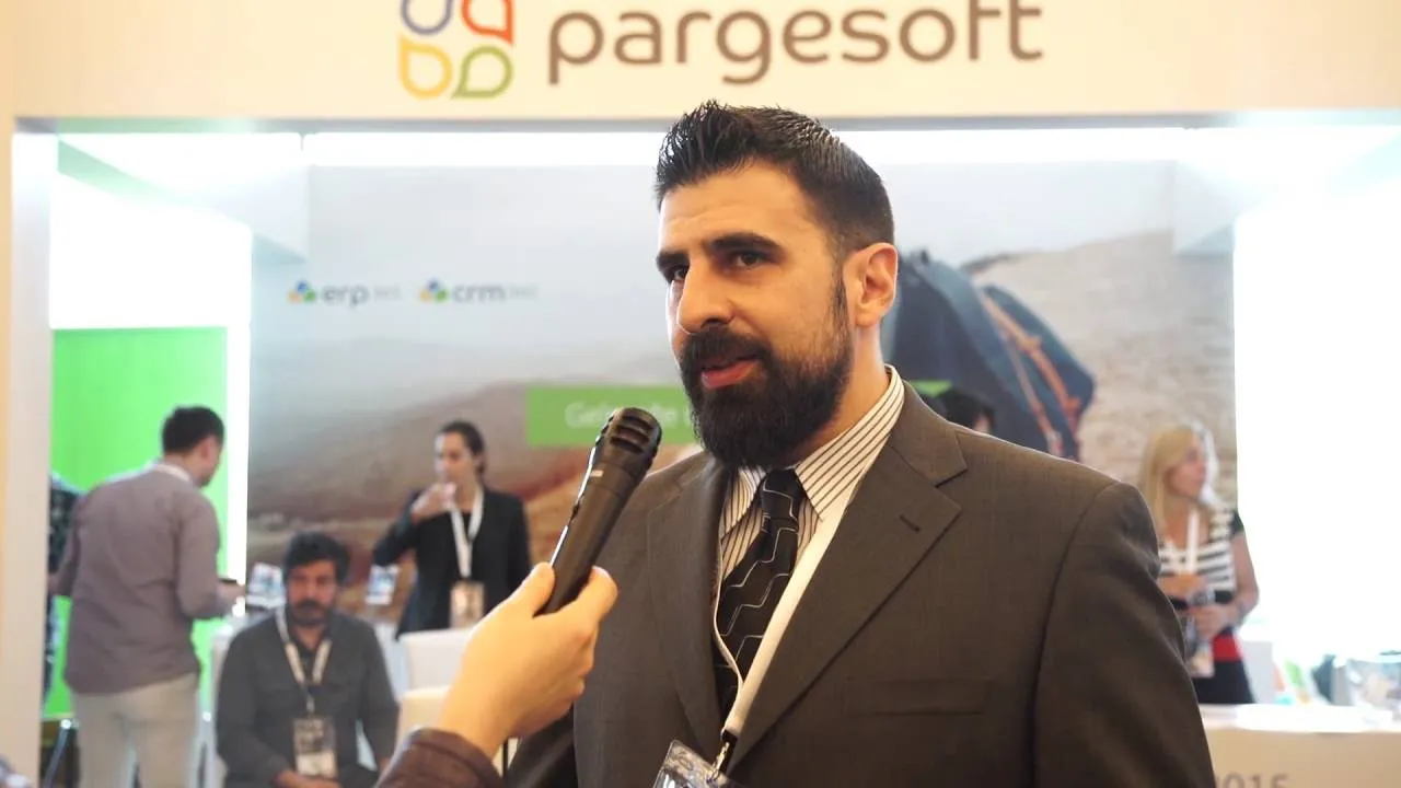 A Tepe Security representative is interviewed at the Pargesoft booth about their collaboration