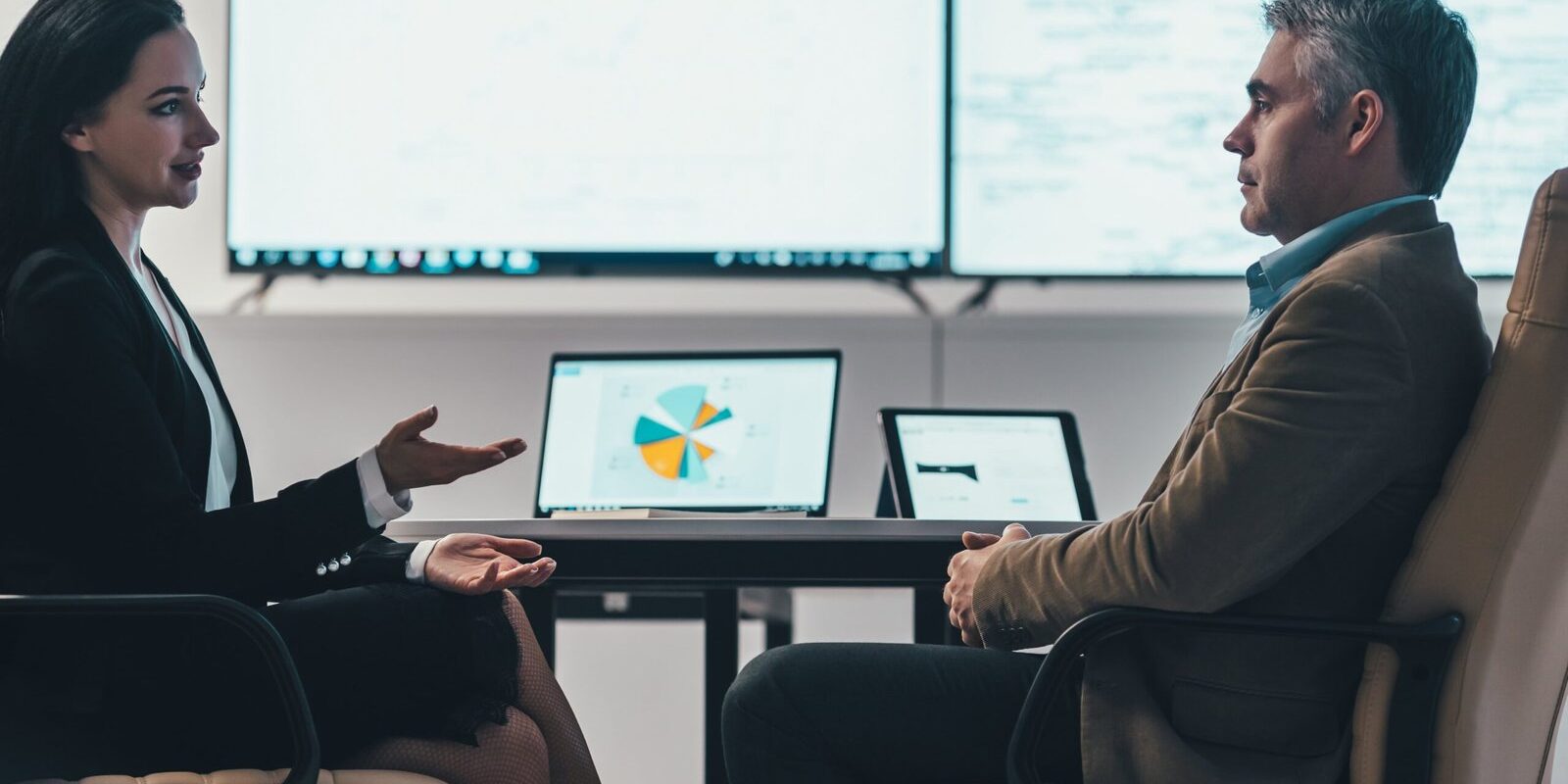 the-business-man-and-a-woman-discussing-at-the-tab-2023-11-27-05-27-17-utc-min-scaled